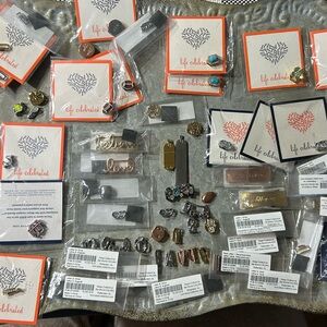 40 new charms 27 charms not packaged 7 bracelets in packaging 1necklace